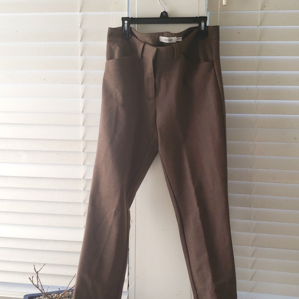 Calvin Klein,size 6 body hugging, comfortable taupe slacks.